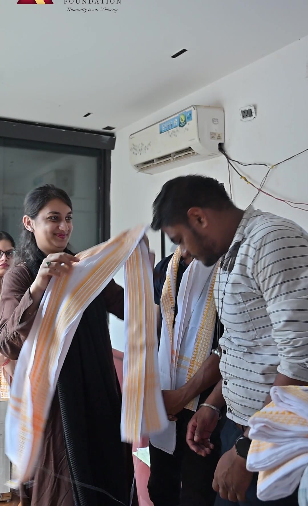 A visiting doctor being welcomed with a shawl at the Dr Nayeem Memorial health camp in Cuttack